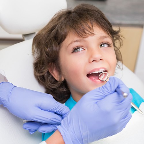 young boy in dental chair