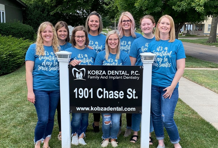 team by Kobza Dental sign