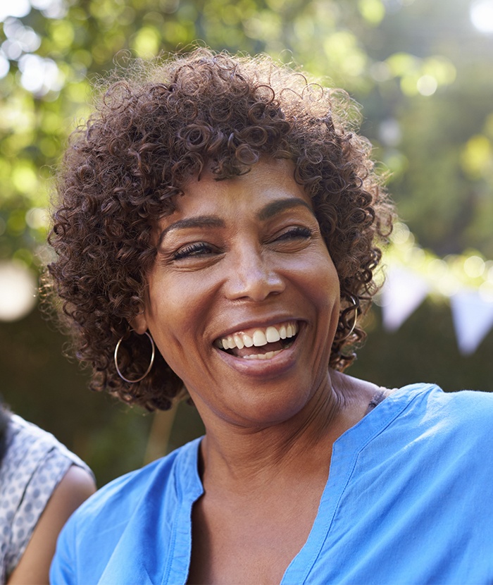 woman laughing outside