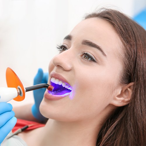 woman getting dental sealants