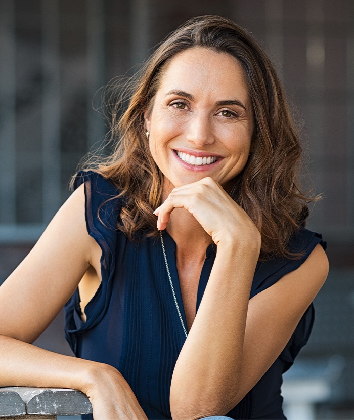 woman in dress smiling