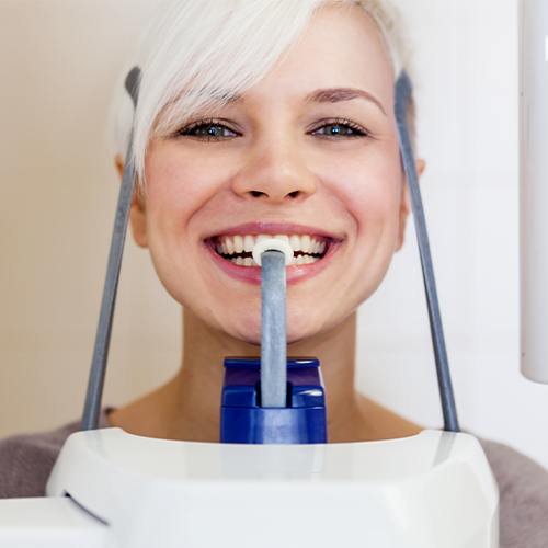 woman in cone beam ct scanner