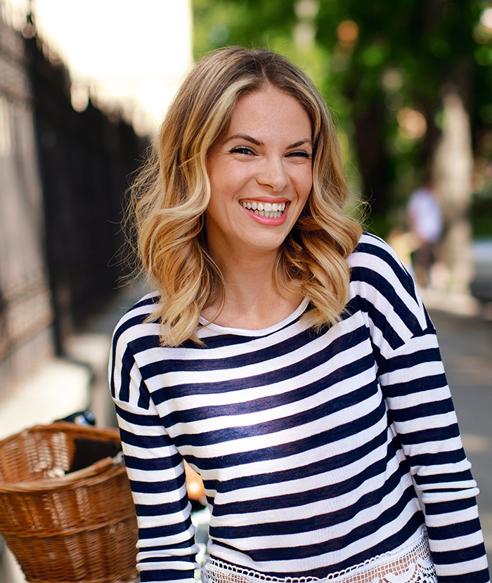 woman in black and white striped shirt