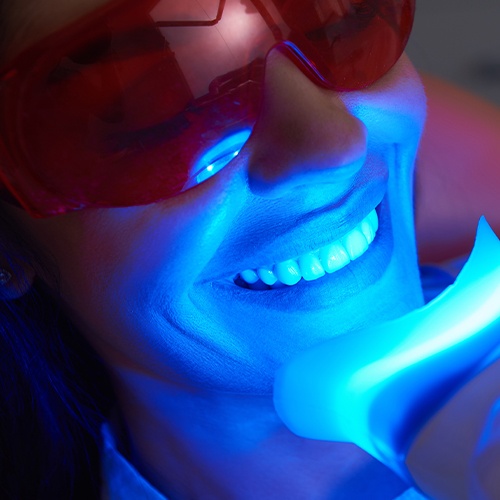 close up of woman getting teeth whitening