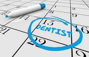 reminder for dental checkup circled on calendar 