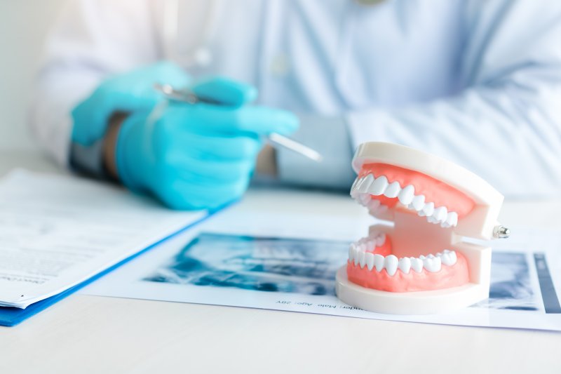 A closeup of dentures on a table in a clinic